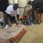 Starr's Mill Shoe Drive Coaches Walker and Jones packing shoes
